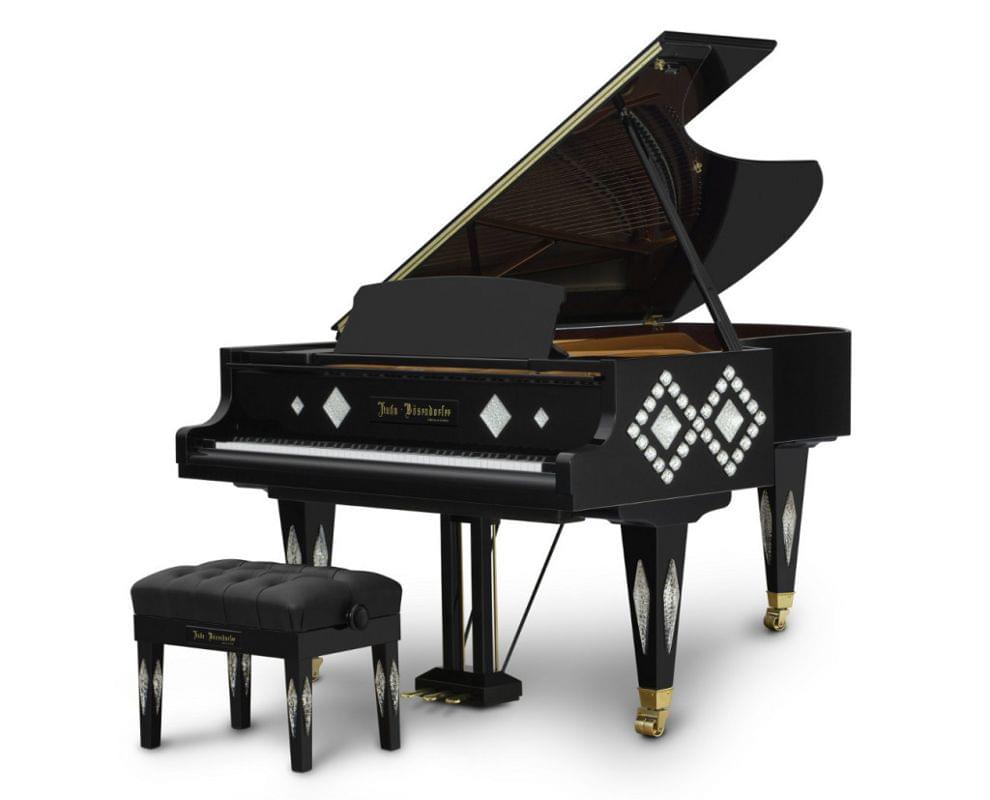 Imagen piano de cola BÖSENDORFER modelo diseño Kuhn con banqueta