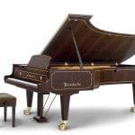 Imagen piano de cola BÖSENDORFER modelo especial Senator nogal pulido con banqueta