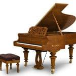 Imagen piano de cola BÖSENDORFER model especial Strauss con banqueta cerezo satinado